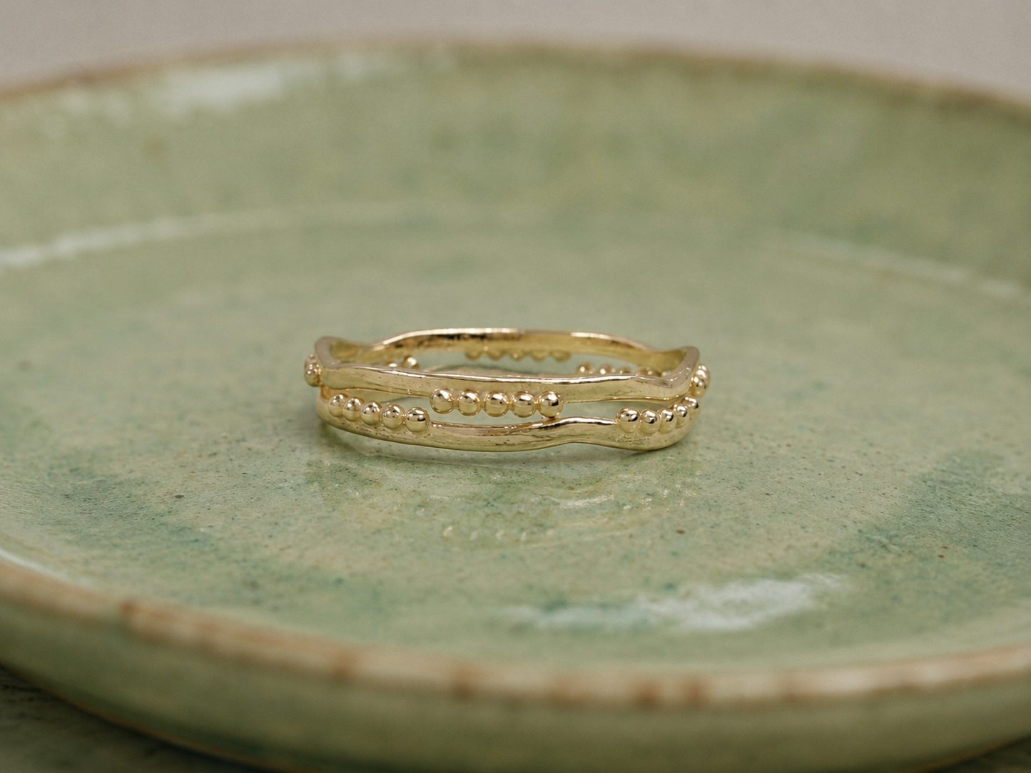 STACK TWO DECORATED VERMEIL RINGS
